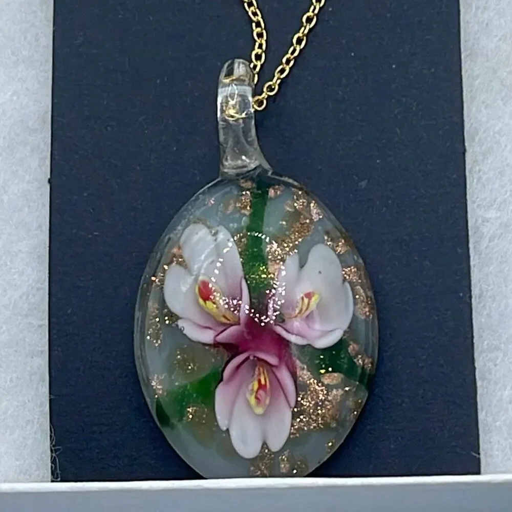 Floral art glass pendant on a 925 plated gold chain.